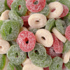 Gummy candy shaped like christmas wreaths in red white and green