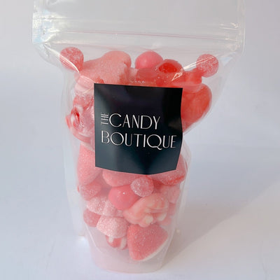 Candy bag full of a variety of pink coloured gummies