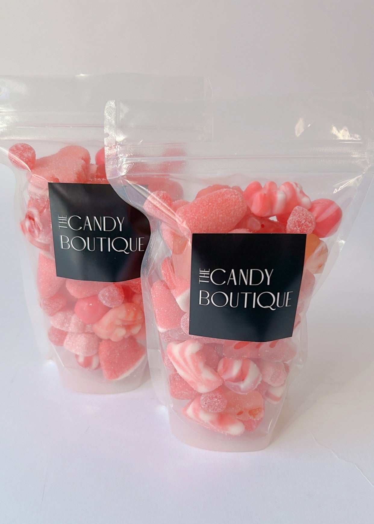 Candy bag full of a variety of pink coloured gummies