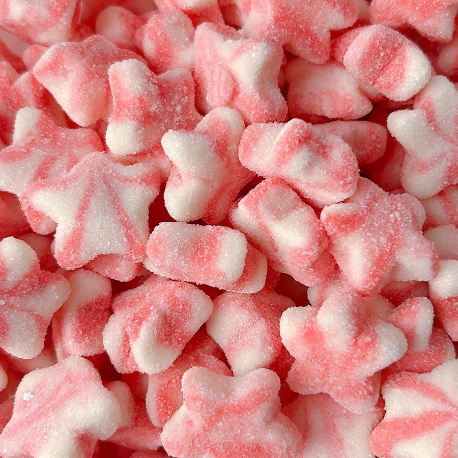 pink and white coloured candy shaped in stars