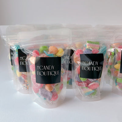 Mix of rainbow coloured gummies in a candy bag