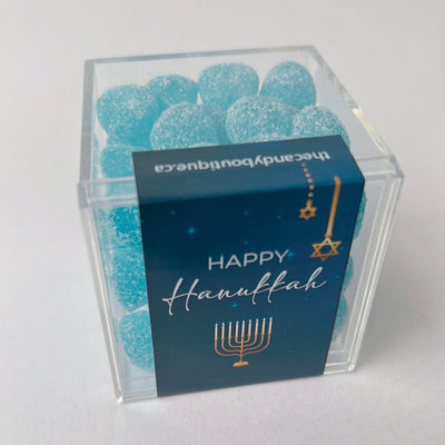 Sour Blue Raspberry Drops candy in an acrylic cube for Hanukkah