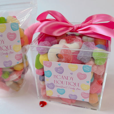 Mix of pastel coloured gummy candy in a large candy box