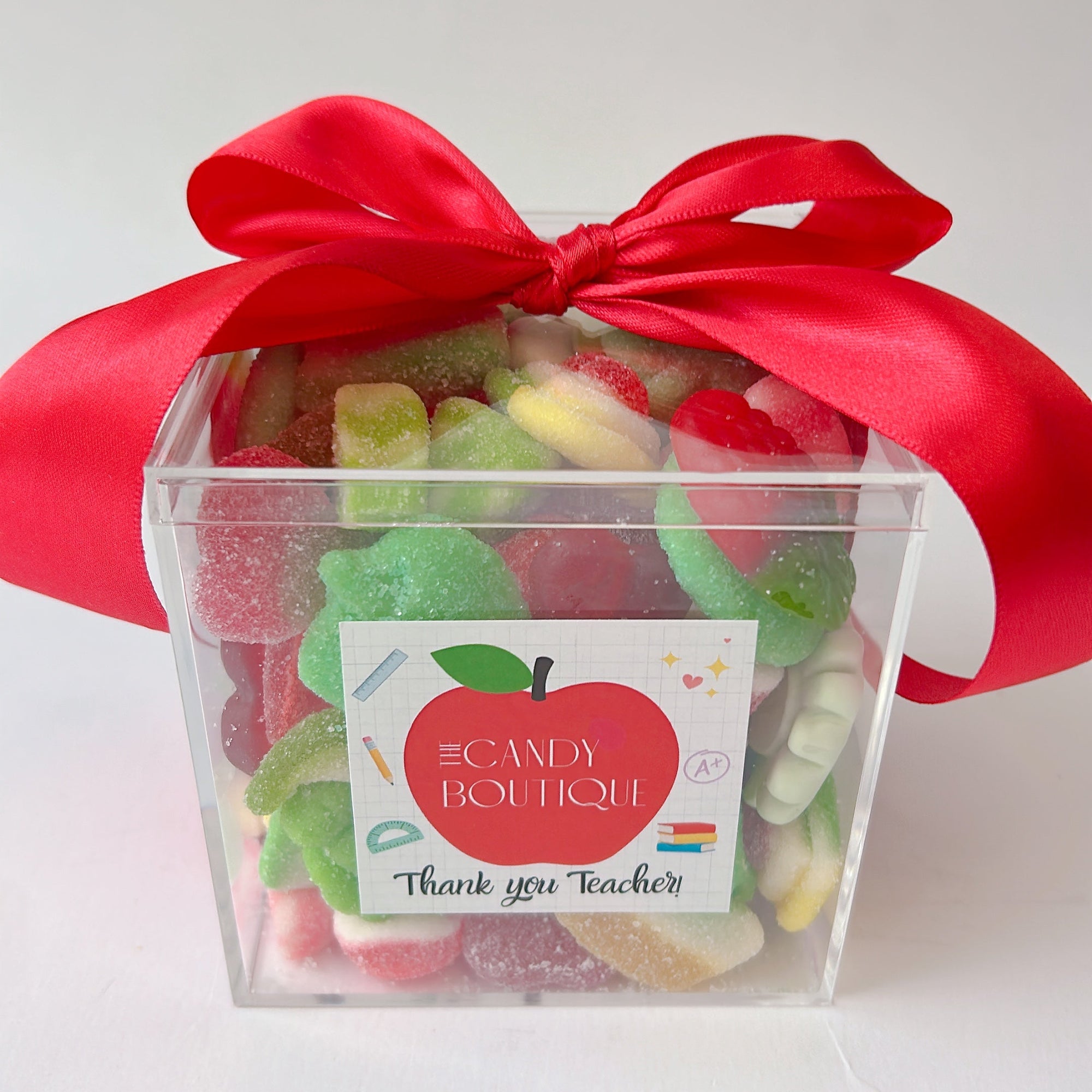 Candy box with a red bow, featuring a 'Thank you Teacher' on the front filled with gummy candy