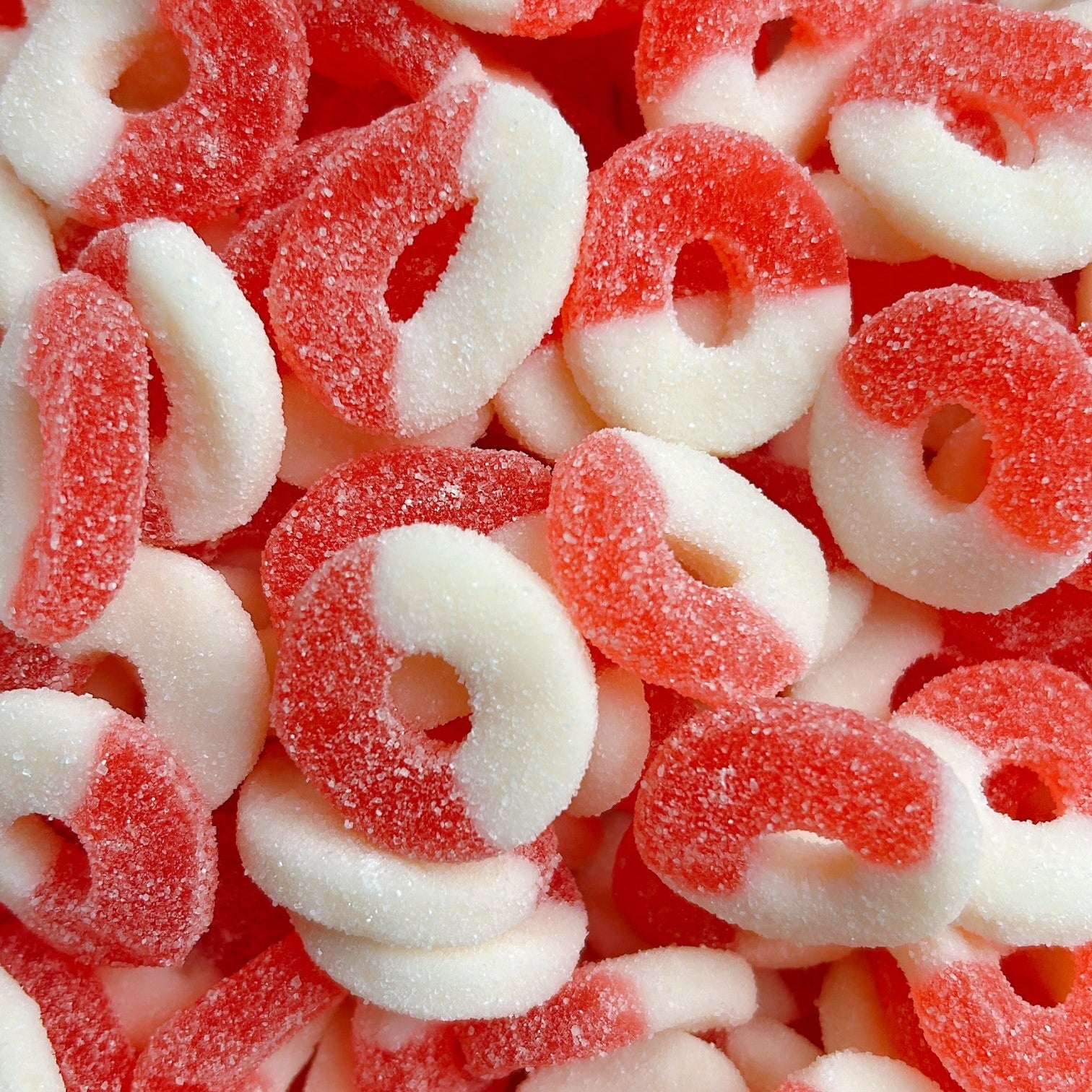 Assorted gummy candy rings in pink and white