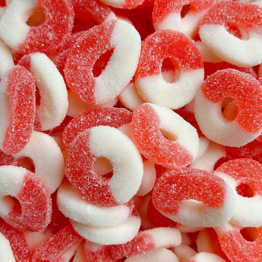 Assorted gummy candy rings in pink and white 